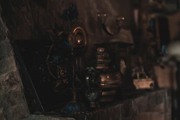 A vintage collection of rare antique pieces glowing softly under warm light.