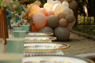 A warm, inviting catering setup with eco-friendly tableware at a sunny outdoor wedding in Albi.