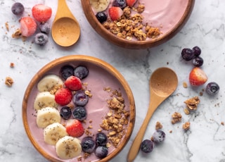 brown wooden spoon on white ceramic bowl