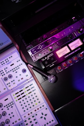 black microphone on audio mixer
