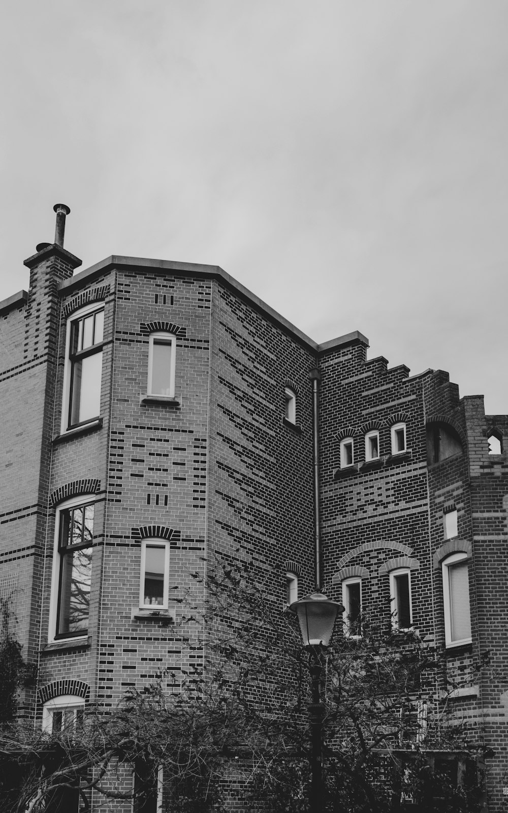 grayscale photo of concrete building