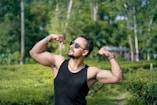 woman in black tank top wearing black sunglasses