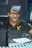 man in black polo shirt wearing eyeglasses