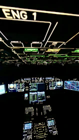 A futuristic motion simulator cockpit glowing with LED controls.