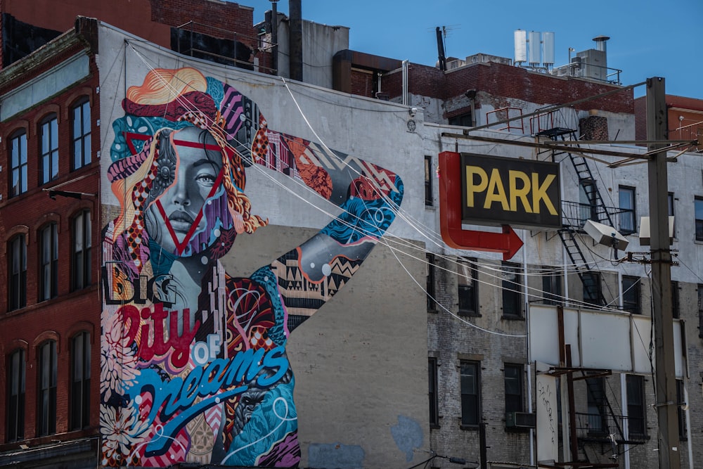 woman in blue and red dress graffiti