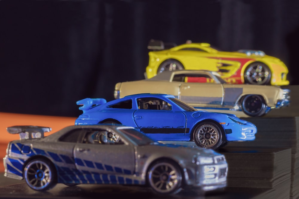 blue and yellow car scale model