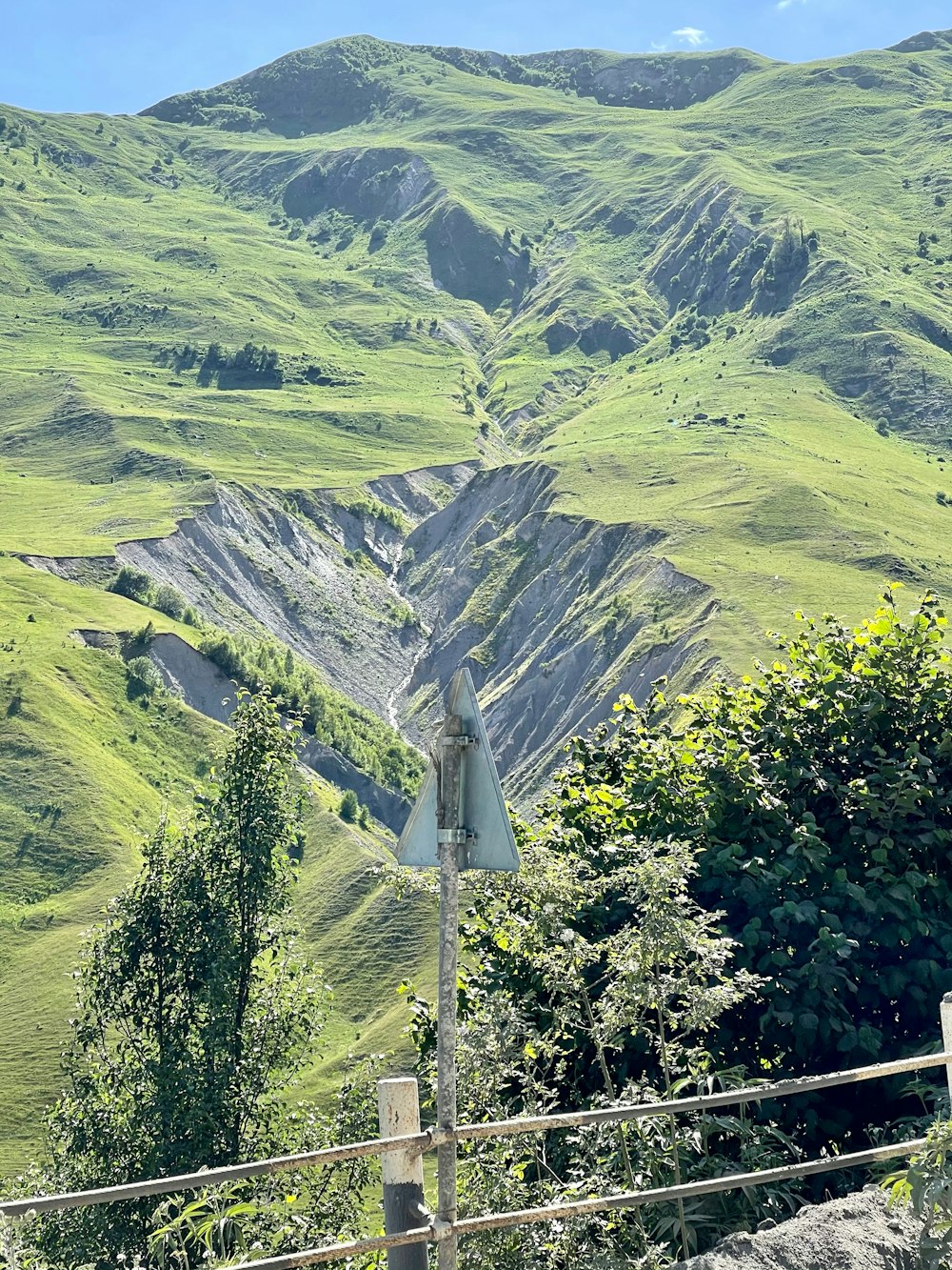 green mountains under sunny sky