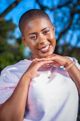 woman in white shirt smiling