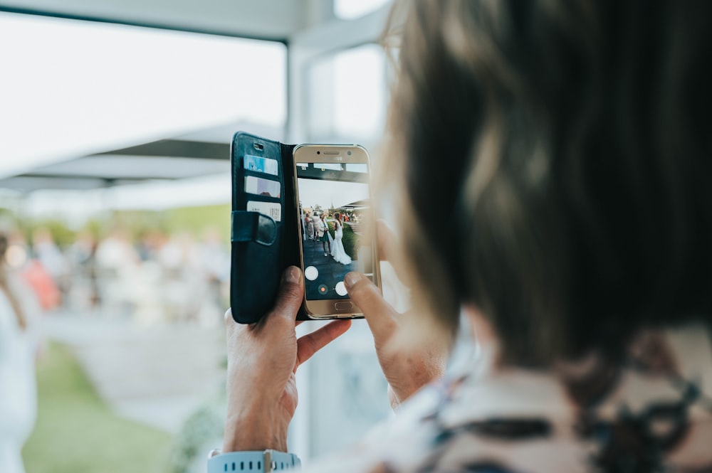 woman taking photo of herself