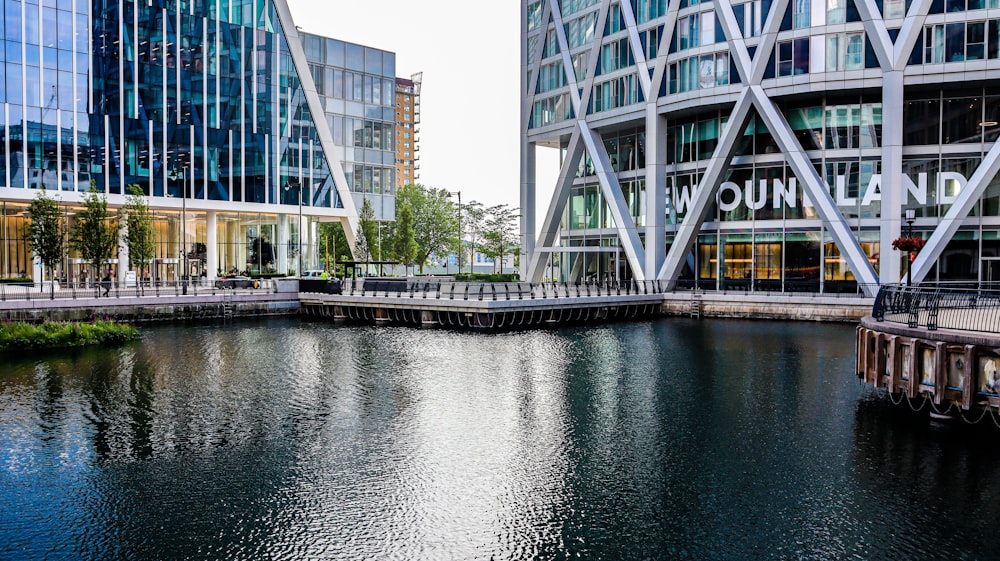 body of water near high rise building during daytime