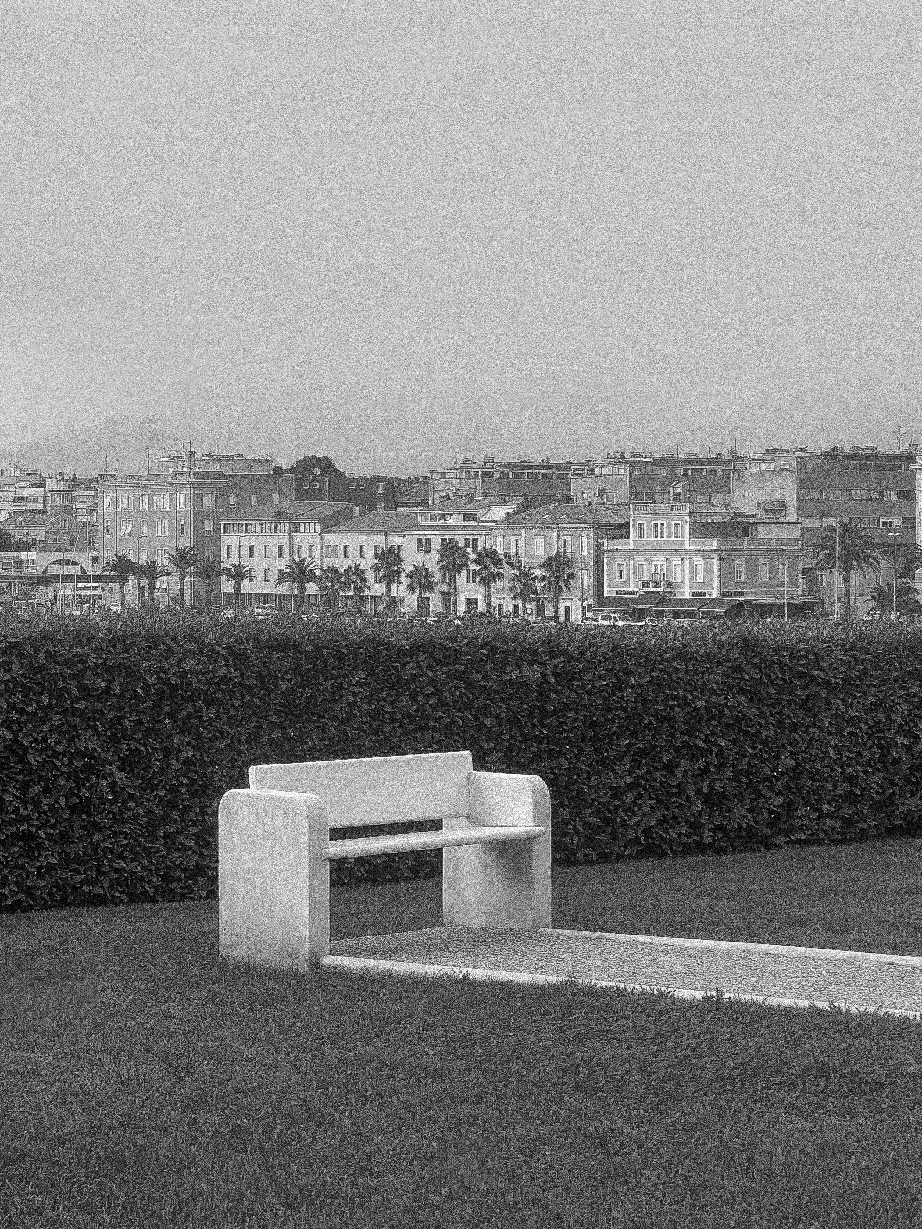 grayscale photo of city buildings