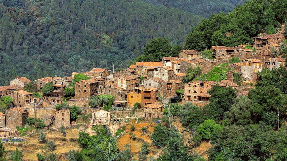 brown concrete houses on mountain