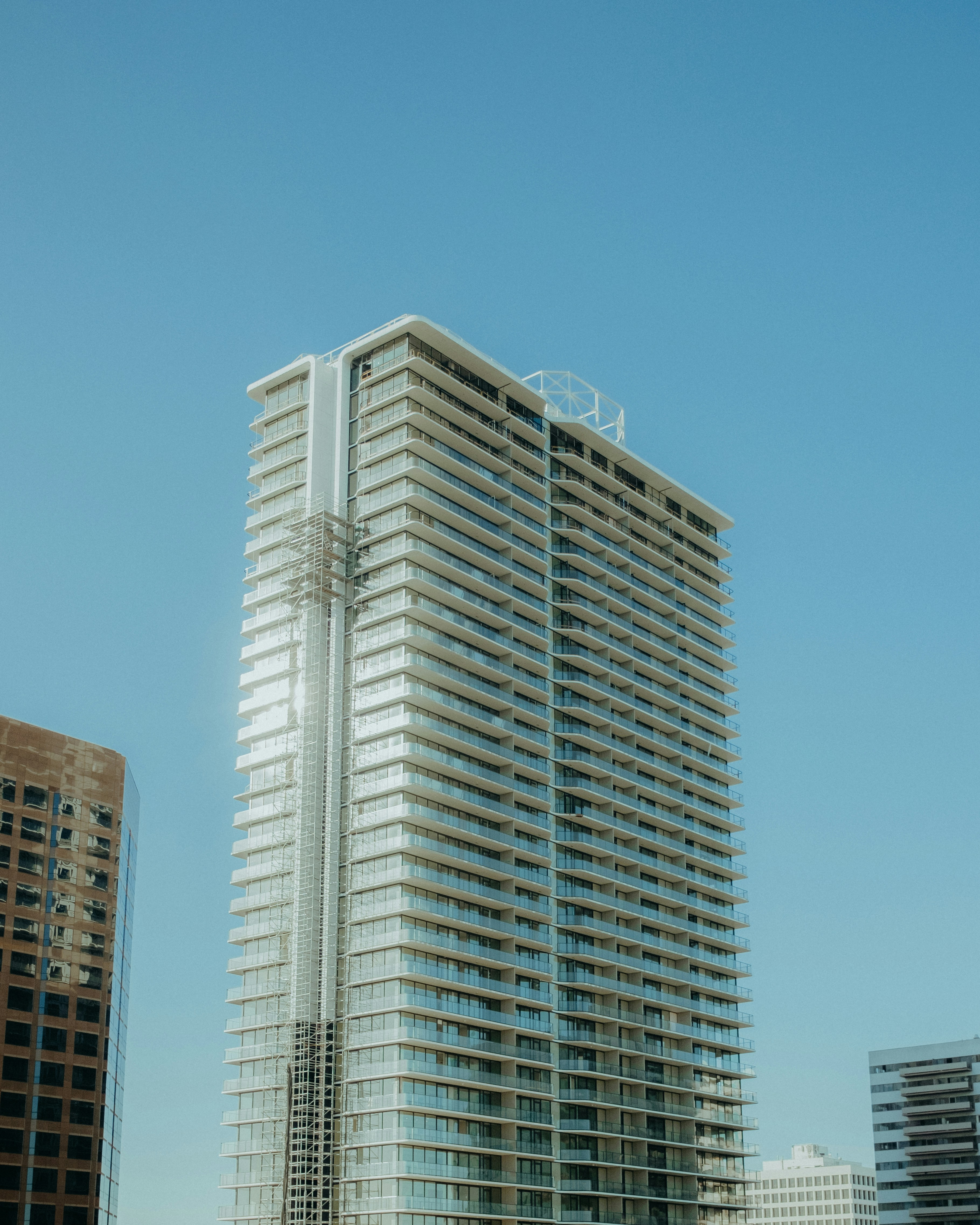 White concrete building under blue sky during daytime photo – Free Los ...