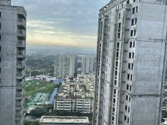 A modern apartment in a bustling city with skyline views.