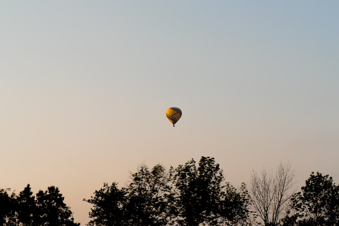 yellow hot air balloon in the sky