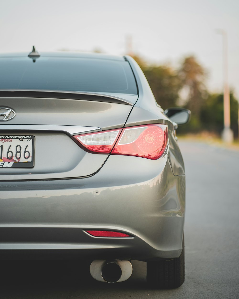 gray honda car on road during daytime