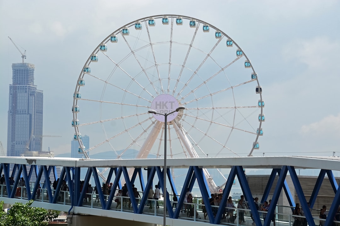 white ferris wheel under blue sky during daytime