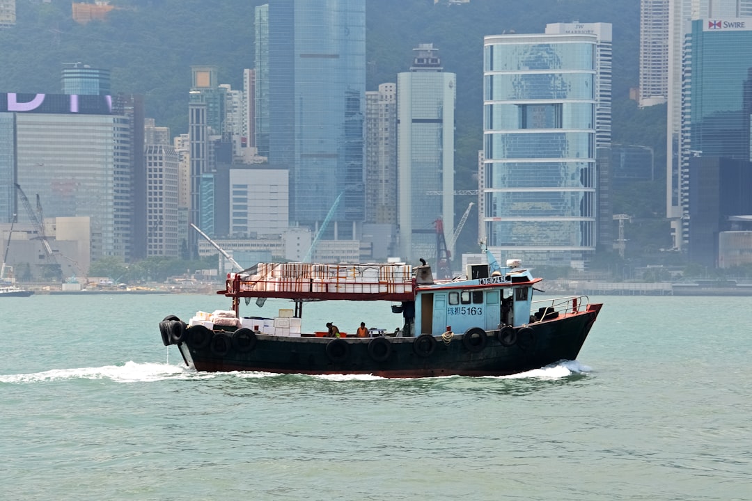 black and red boat on water