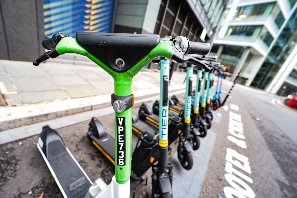 green bicycle on gray concrete road