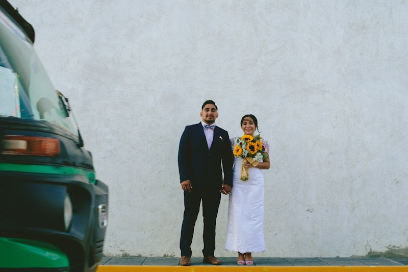 Groom in suit with bride