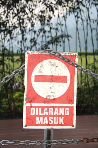 red and white no smoking sign