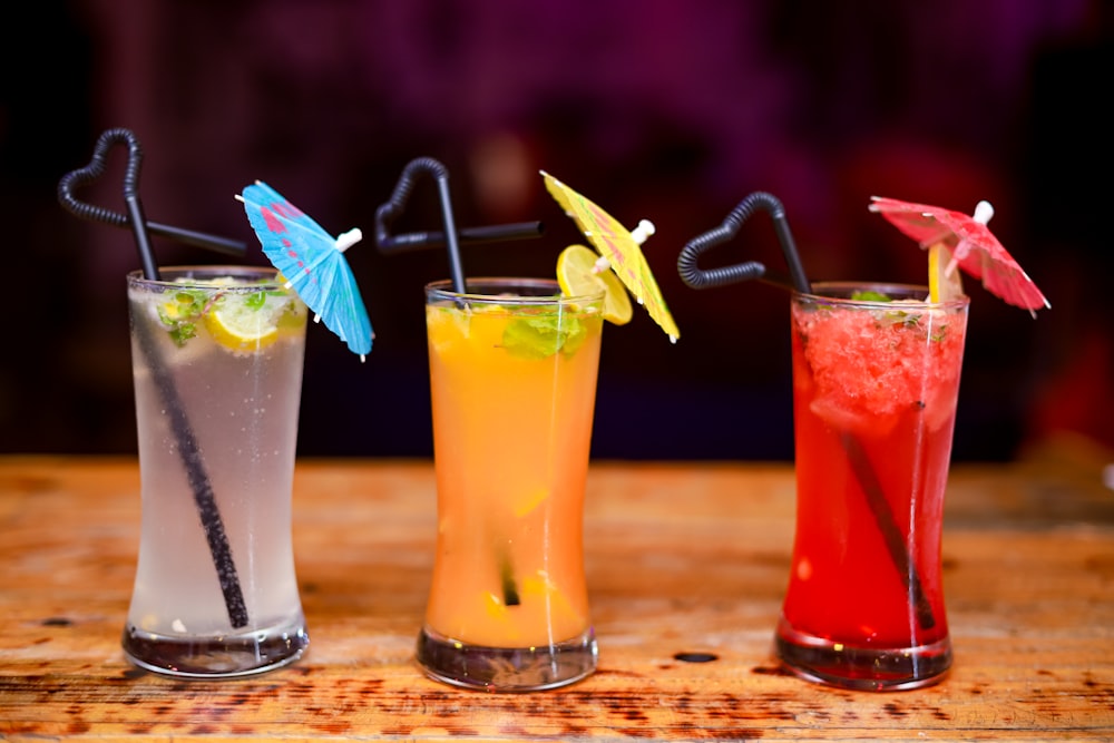 clear drinking glass with orange juice