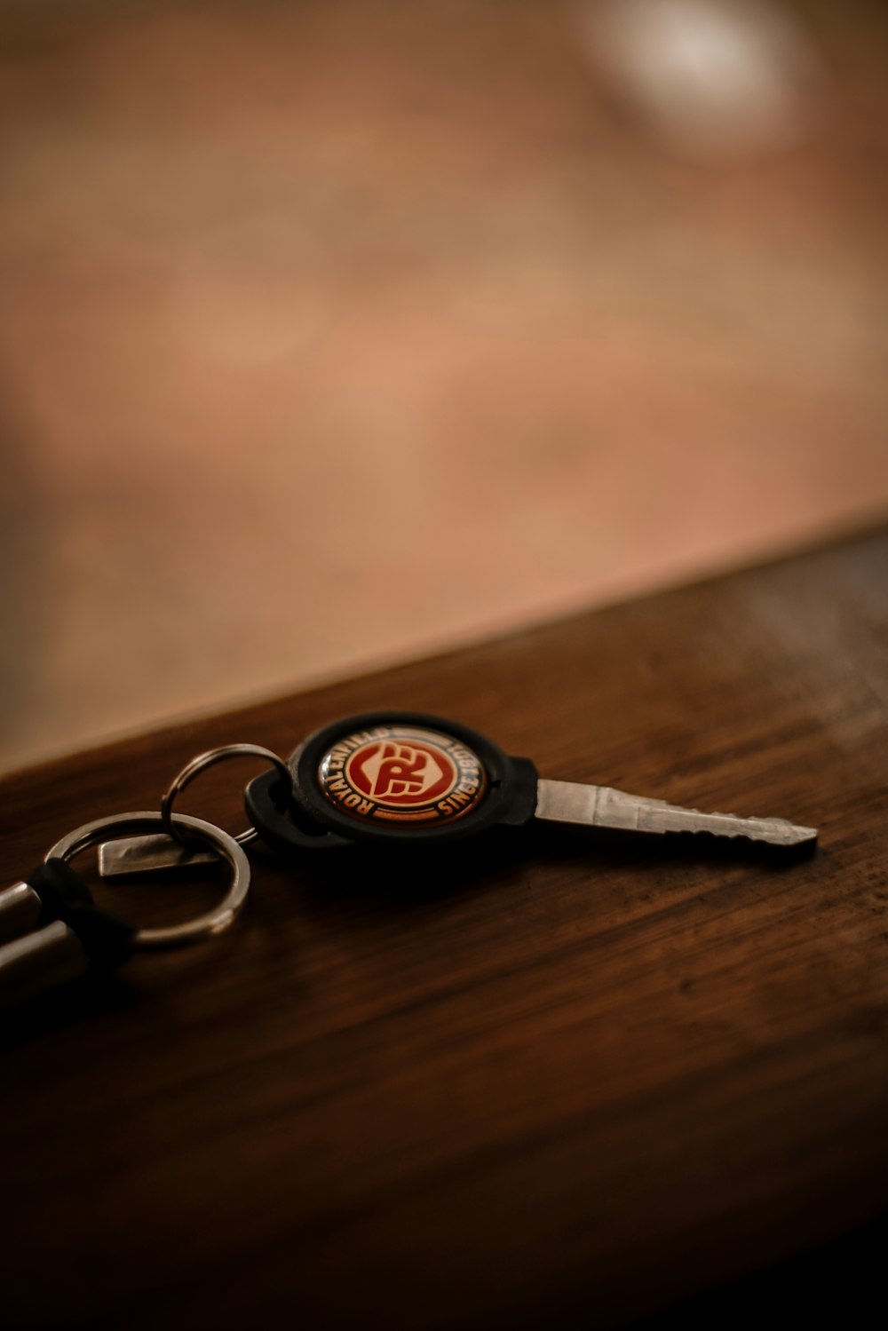 black and silver round keychain