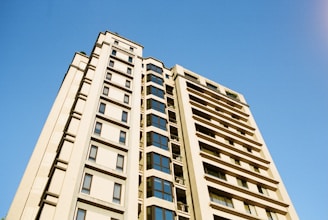 Exterior view of a commercial apartment building built from the ground up.