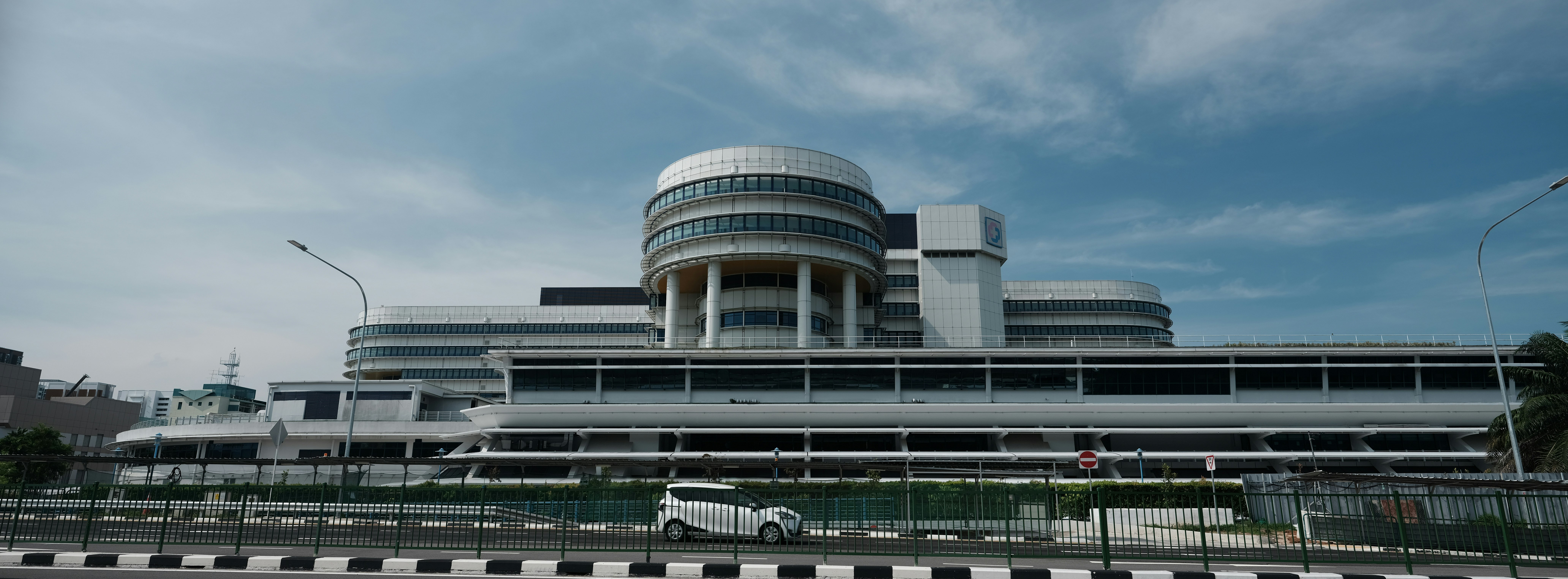 white concrete building under blue sky during daytime