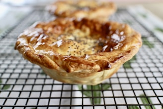 A close-up of delicious homemade pie cooling on the kitchen windowsill