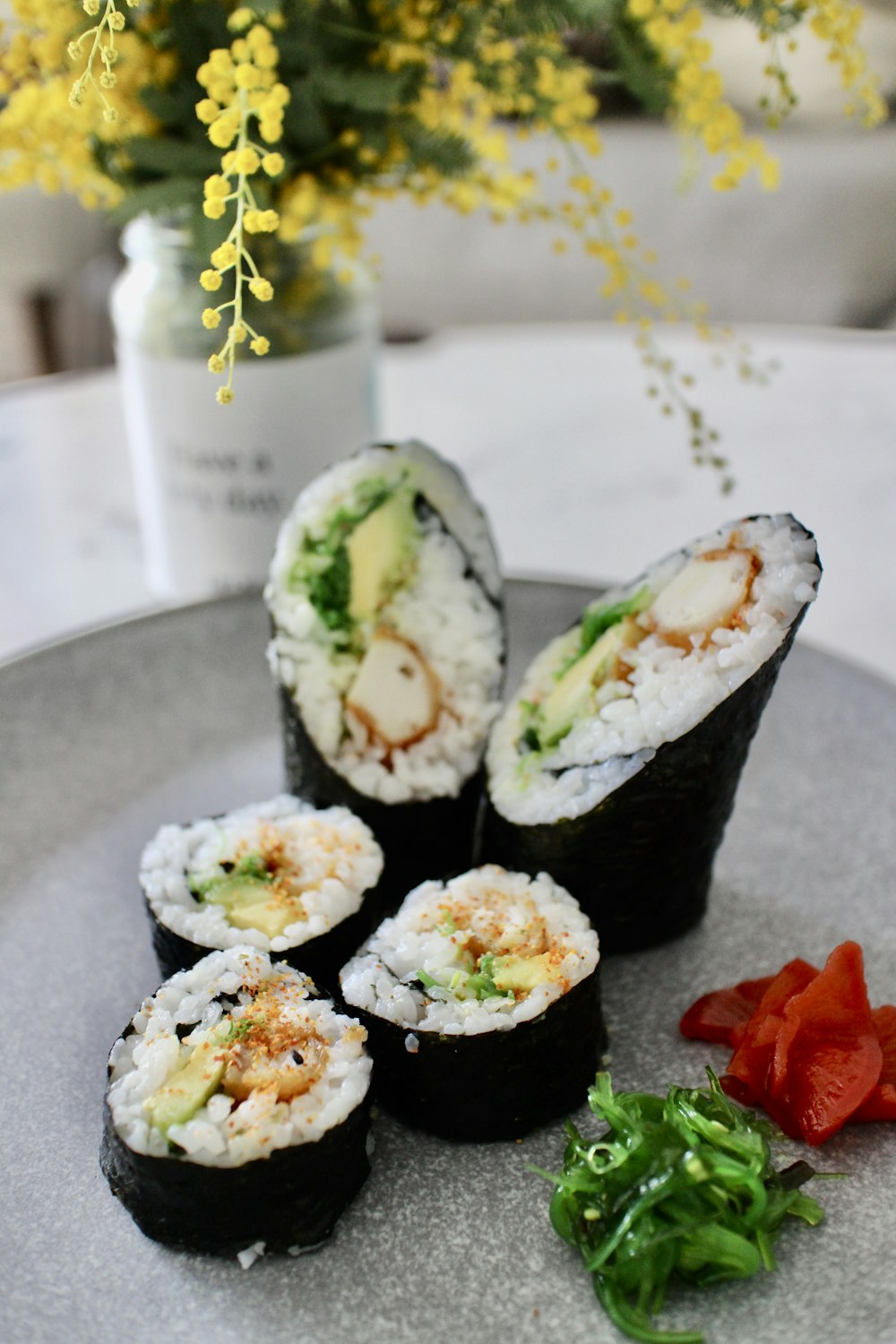 sushi on black ceramic plate