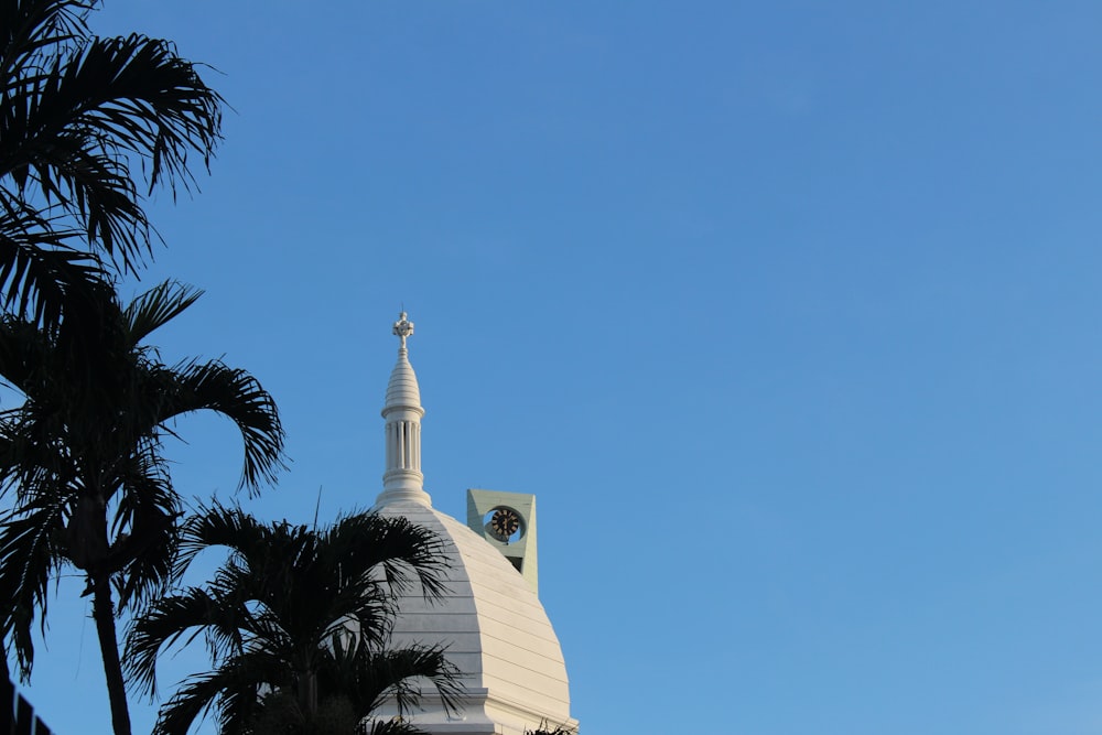 white concrete building under blue sky during daytime