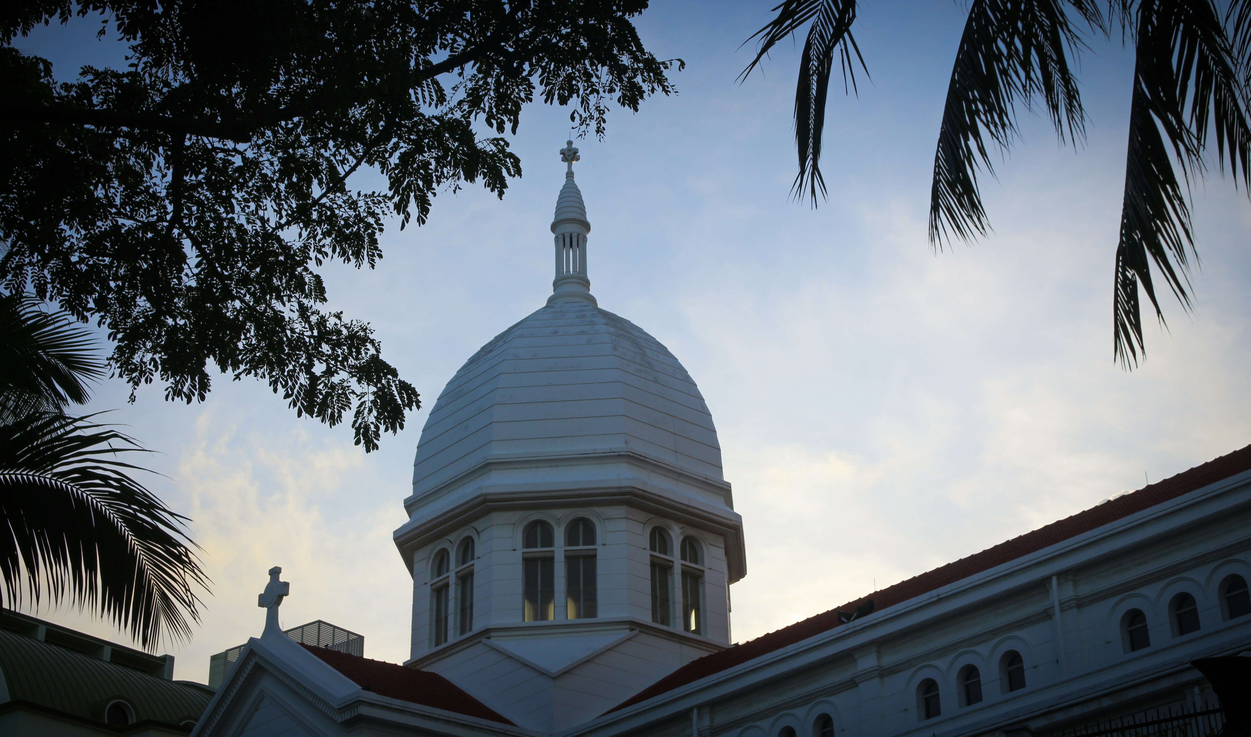 white dome building under white clouds during daytime