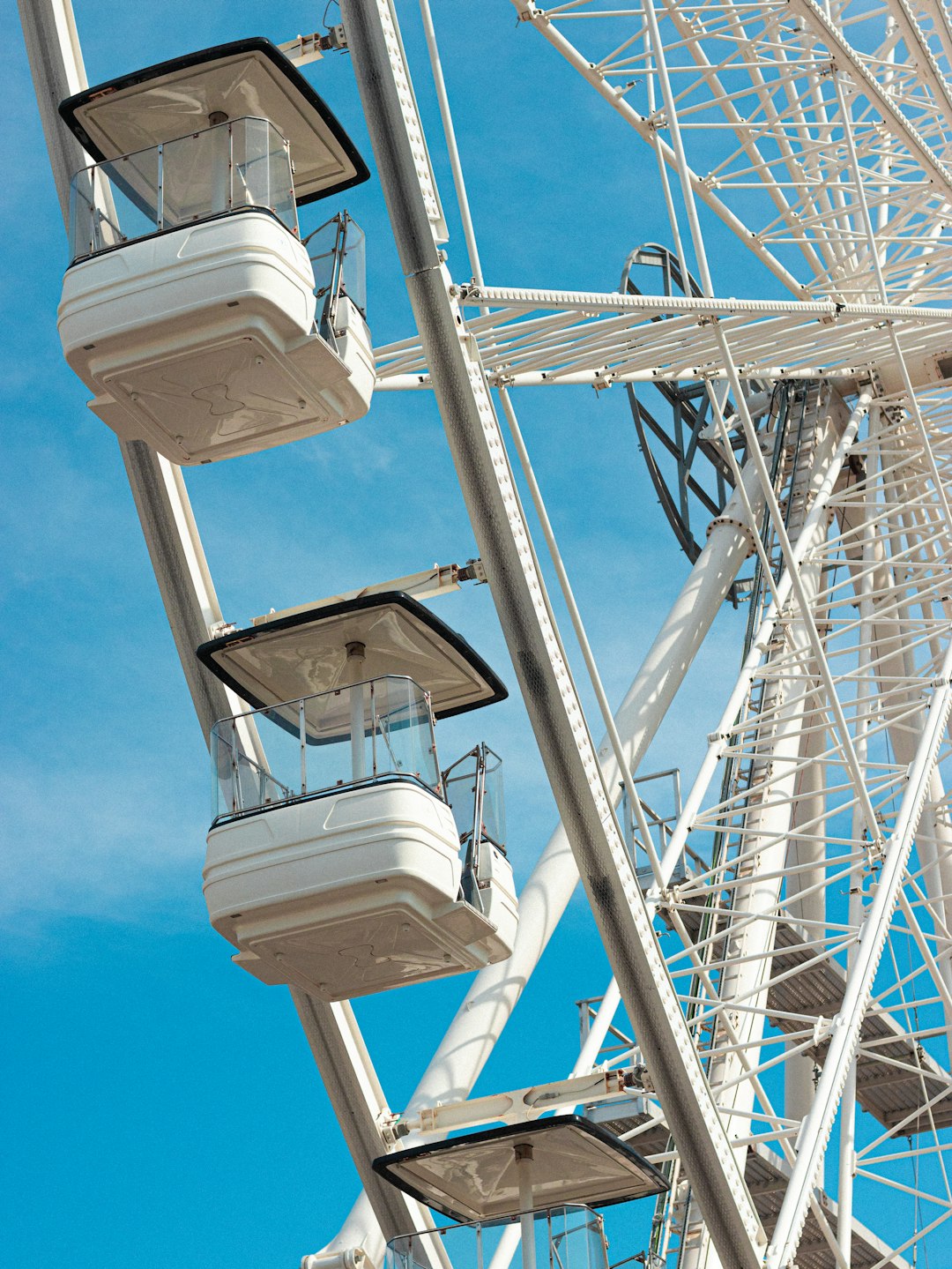 white and gray metal tower under blue sky during daytime