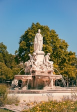 gray concrete statue of man and woman