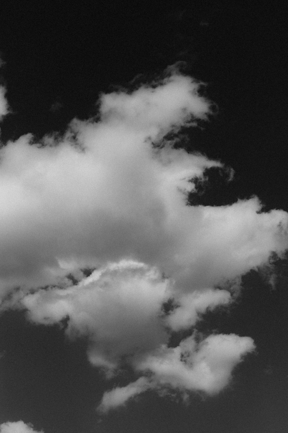 grayscale photo of clouds in the sky