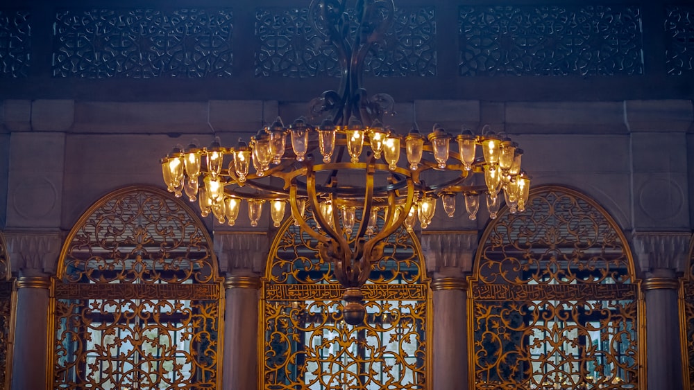 gold and white uplight chandelier