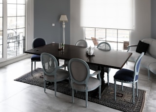 white and black dining table and chairs