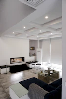 black flat screen tv on black tv rack