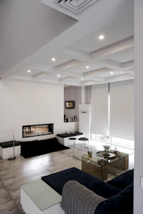 black flat screen tv on black tv rack