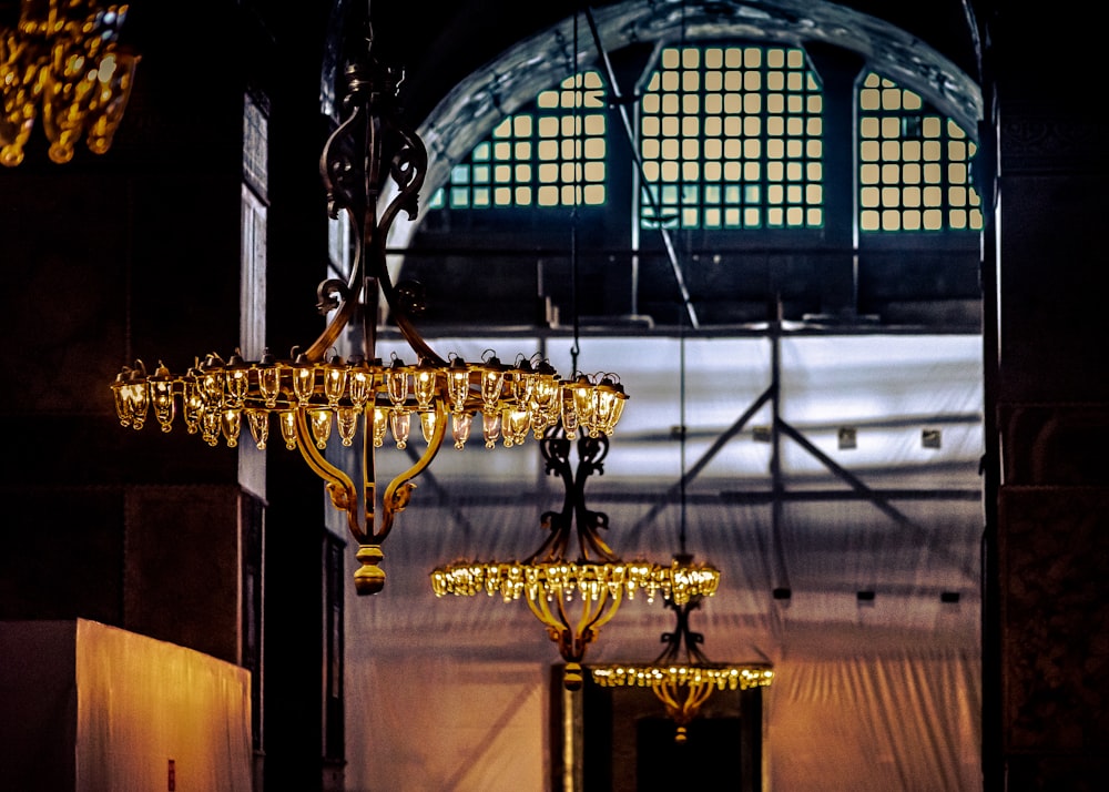 brass uplight chandelier inside building