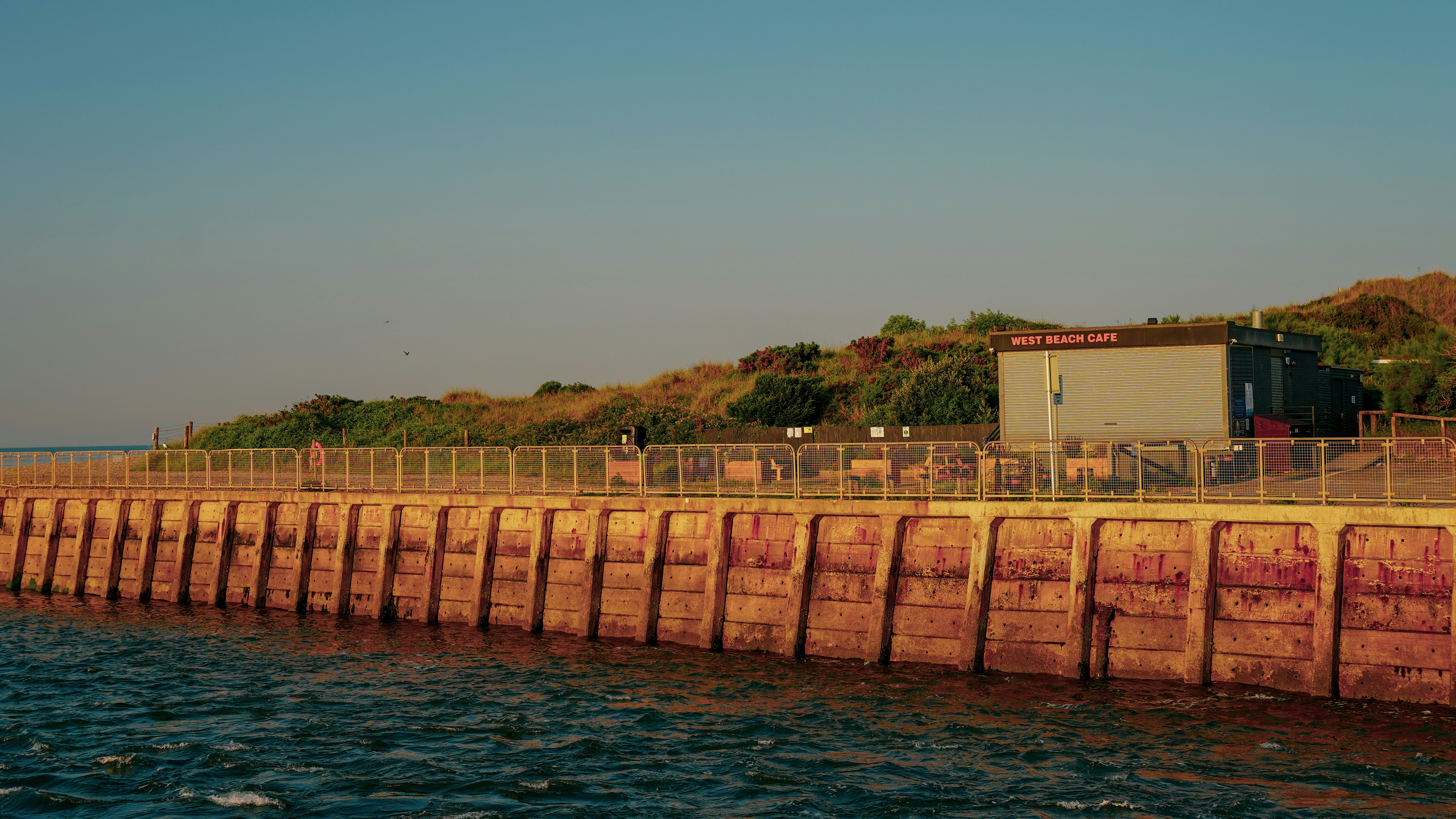 brown concrete bridge over the river