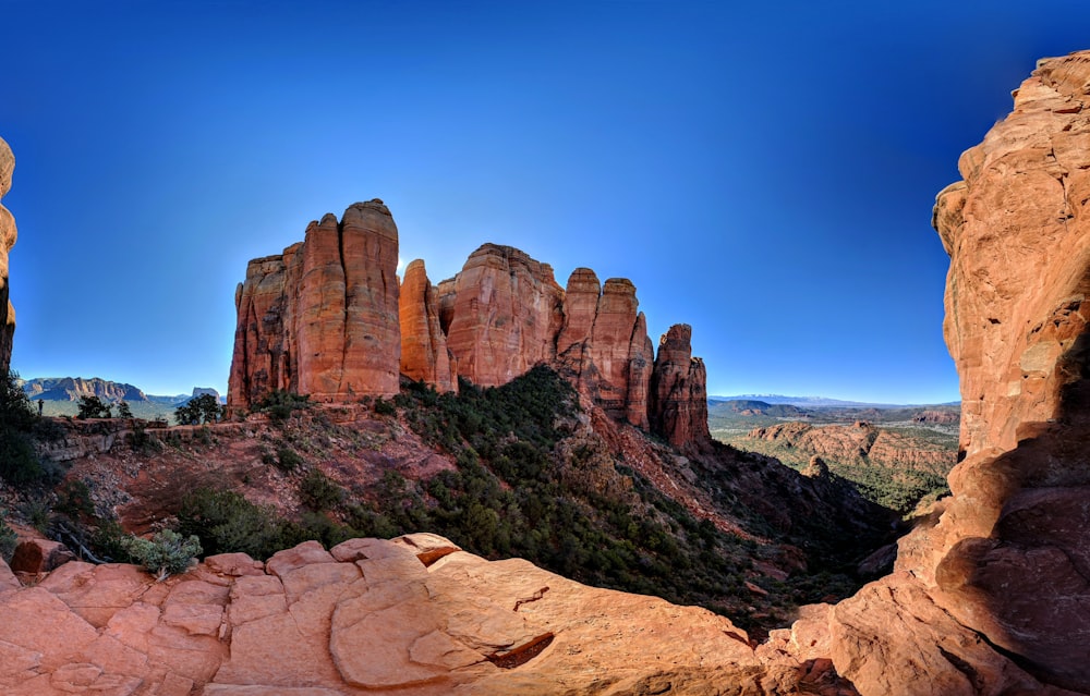 brown rock formation under blue sky during daytime