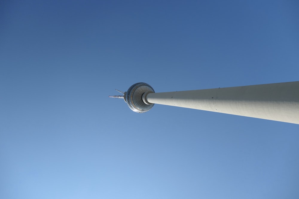 white and black metal post under blue sky during daytime