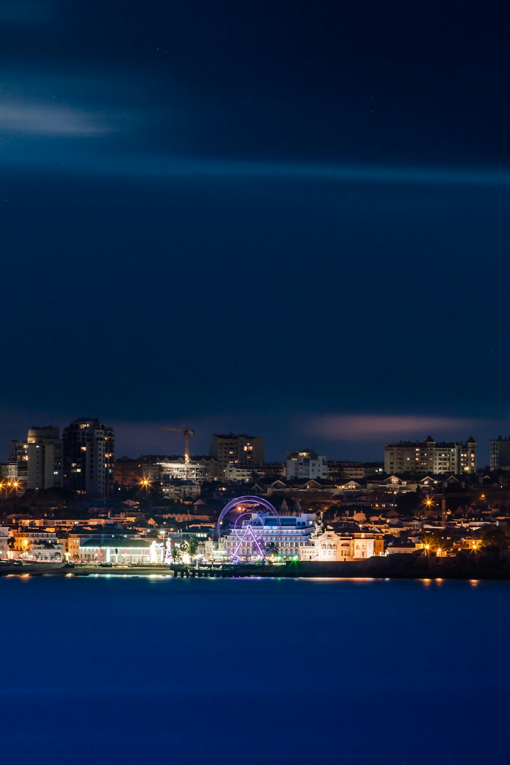 city skyline during night time