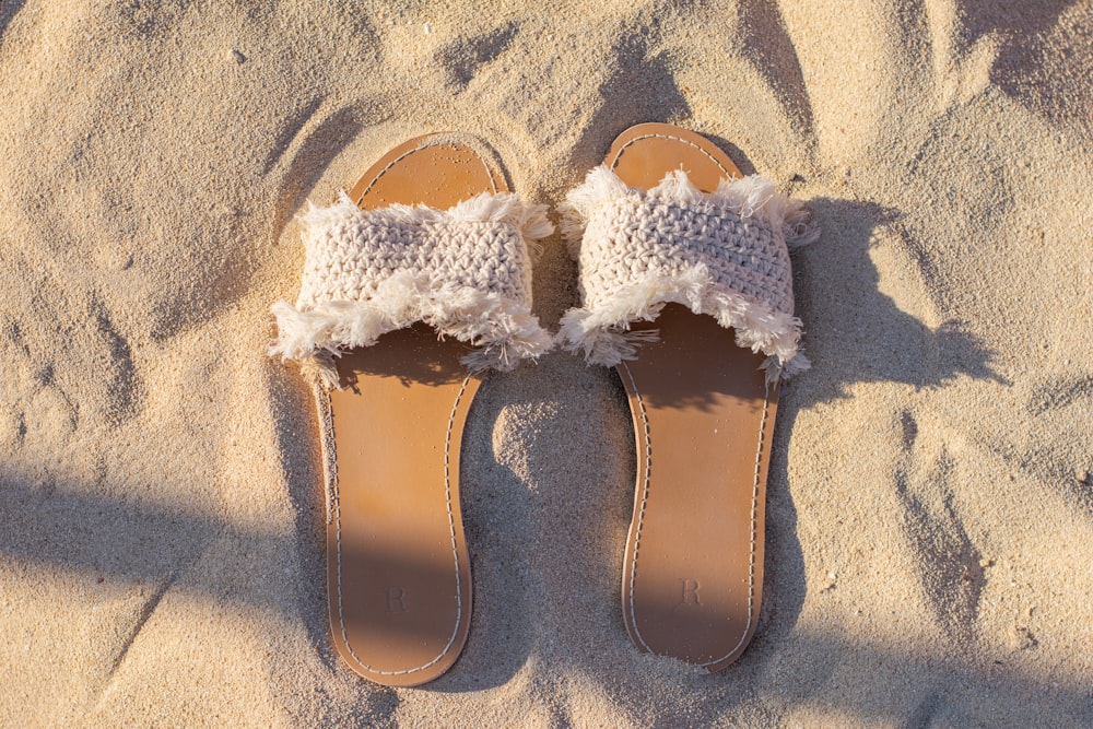 brown and white leather sandals