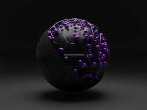 purple and green ball on white surface