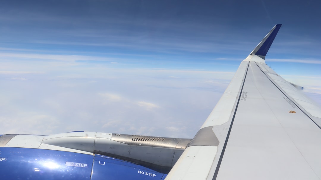 white and blue airplane under blue sky during daytime, Airplane in the sky</p></figure><p>