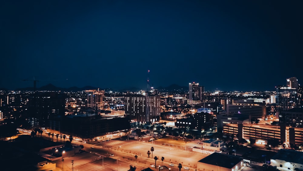 city skyline during night time