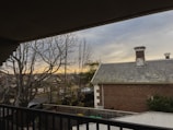 Comfortable balcony view overlooking a quiet neighborhood.